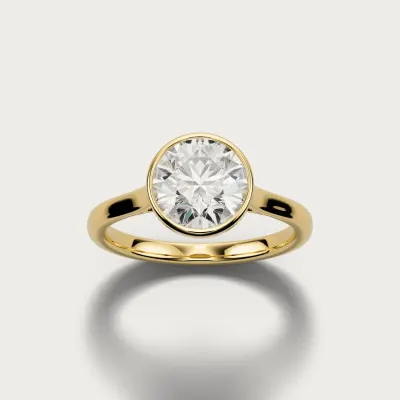 Bezel Solitaire in yellow gold