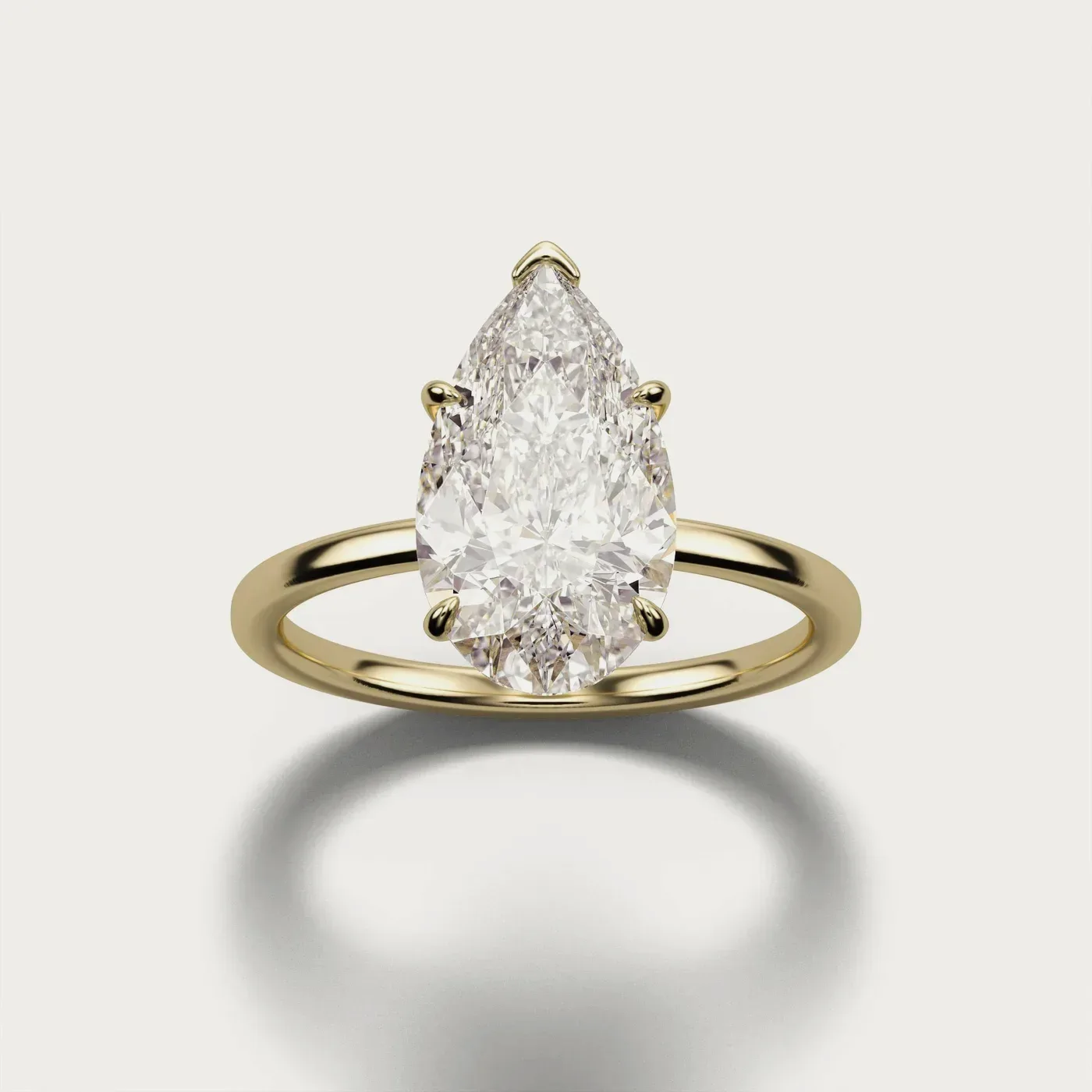 Classic Solitaire, pear in yellow gold