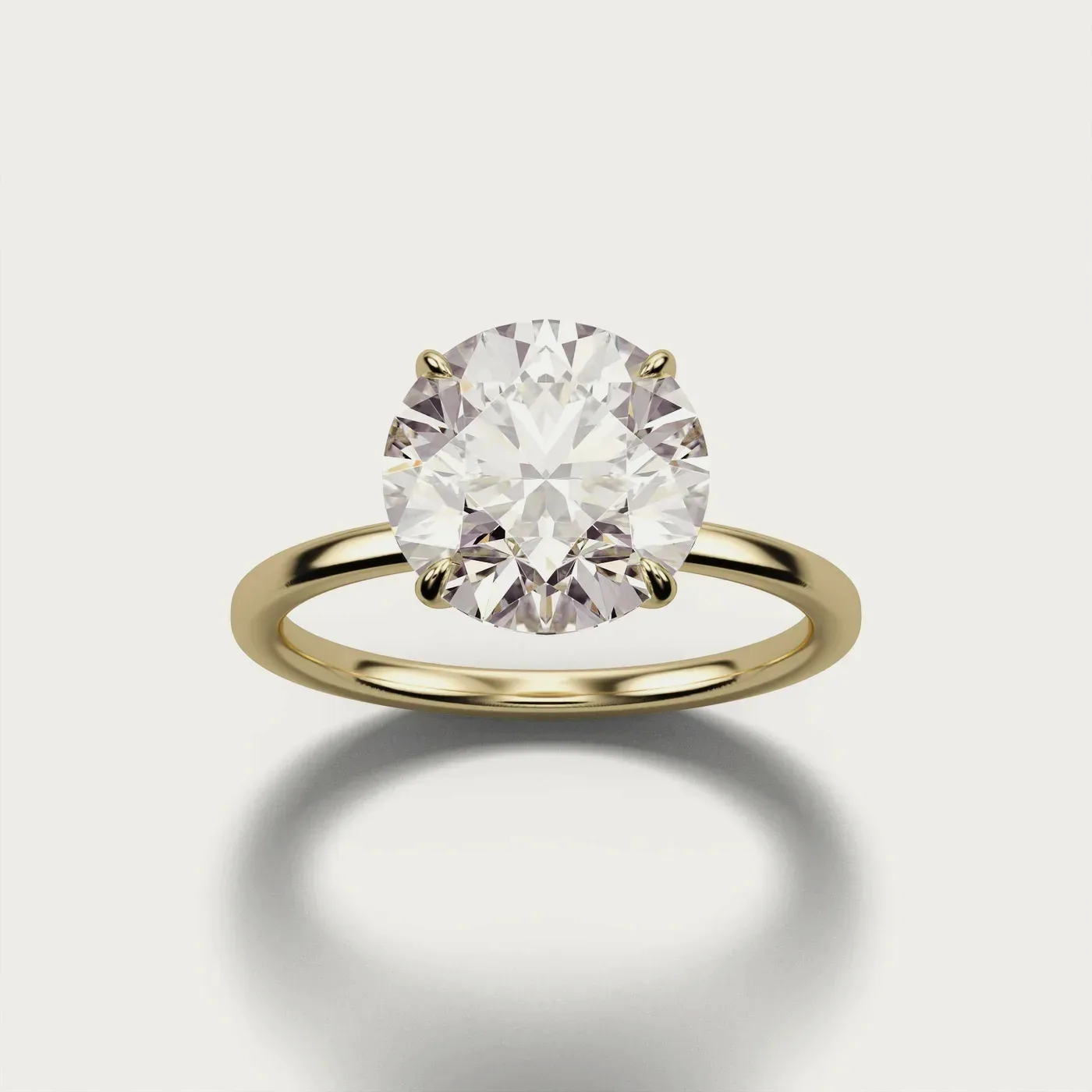 Classic Solitaire, round in yellow gold