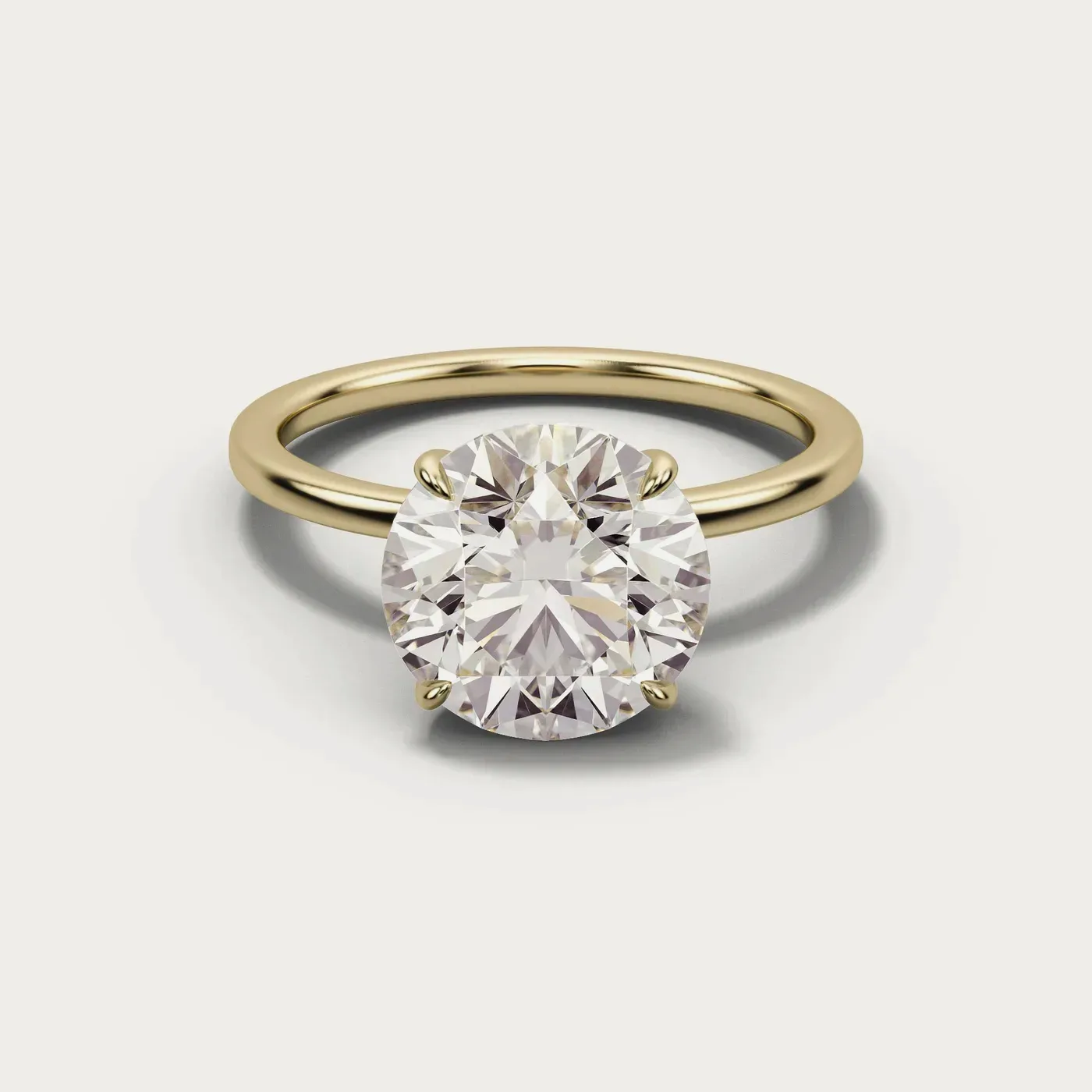 Classic solitaire ring in yellow gold, seen from above