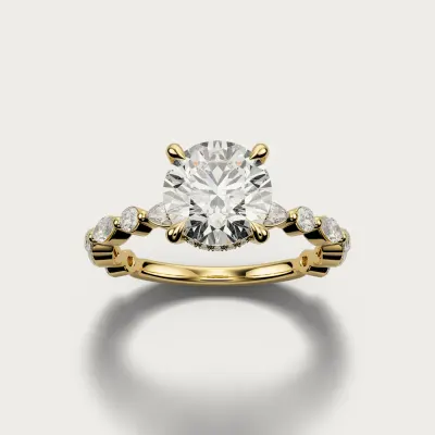 Marquise & Round in yellow gold